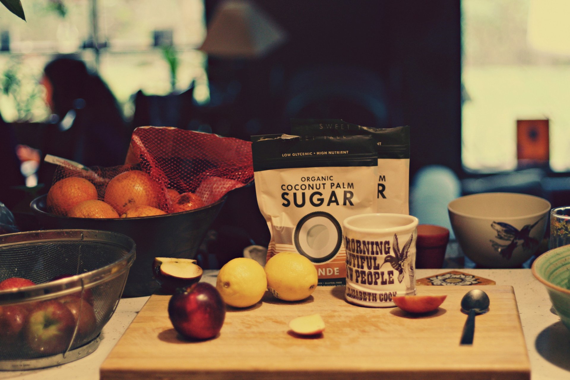 cukier cytryny deska kubek kubek łyżka pomarańcze jabłka