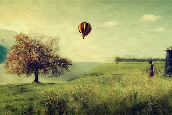 Dziewczyna w wiosce rzuca piłkę