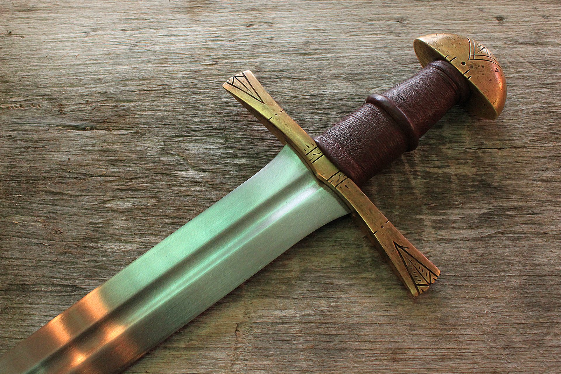 miecz rękojeść stal tło