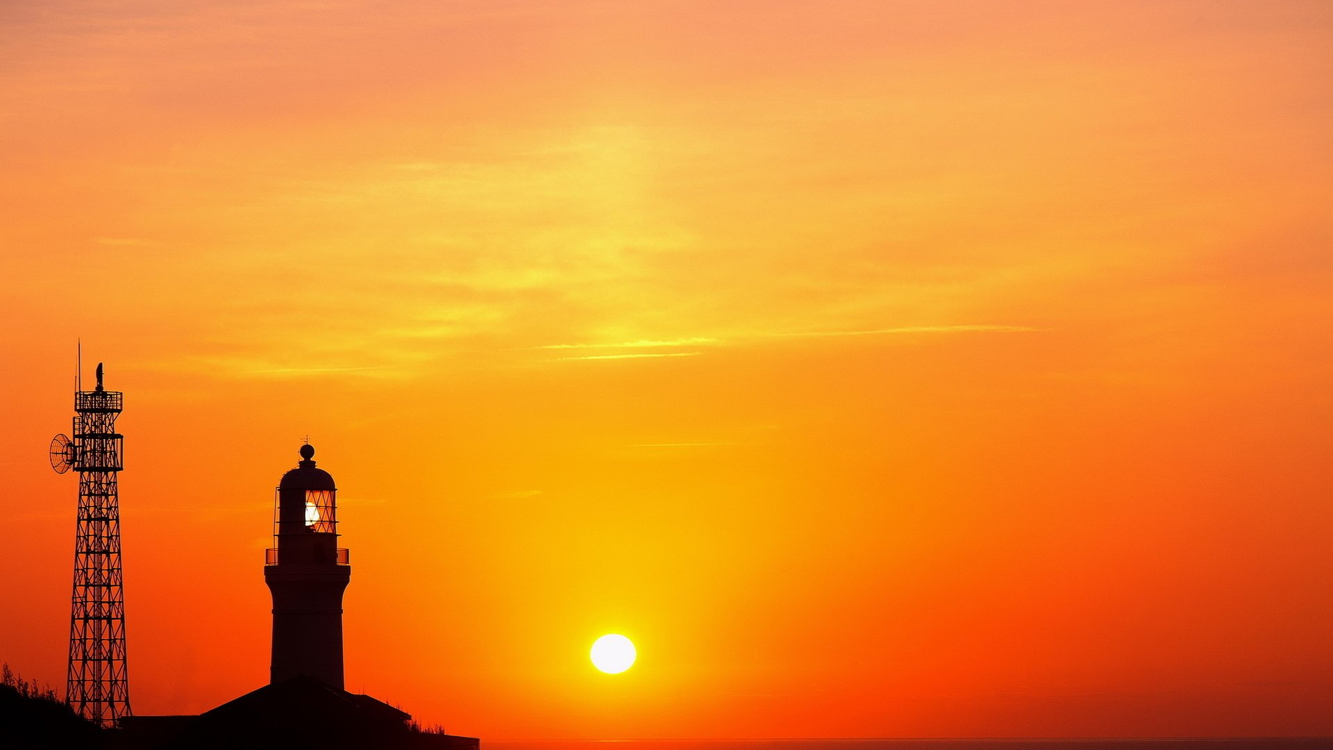 latarnia morska wieża słońce niebo chmury